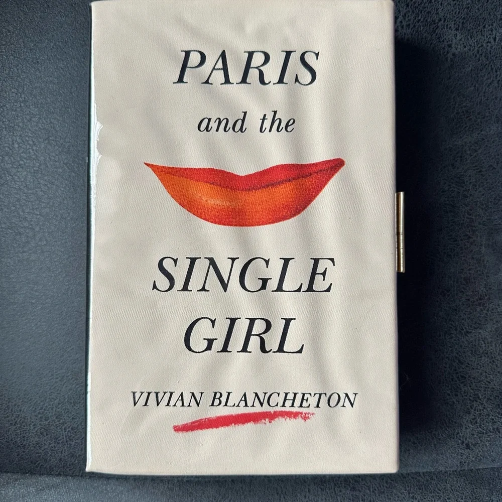 Kate spade paris and the single girl book clutch